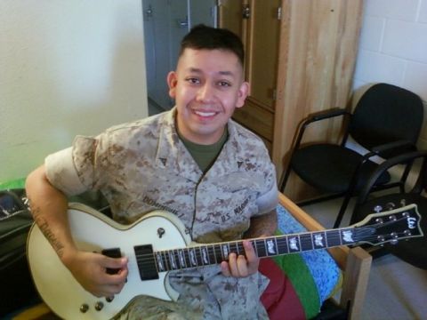 Marine Cpl. Juan Dominguez, here before his injuries, lost both of his legs and his right arm in an explosion in Afghanistan.