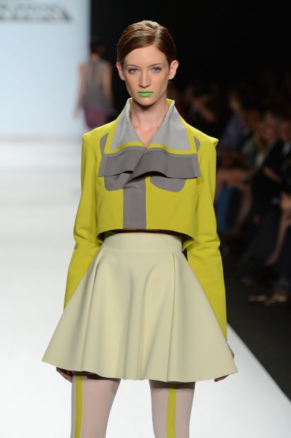 Elena Slivnyak, a contestant on "Project Runway," showcased an edgy, modern collection, complete with green and yellow lipsticks.