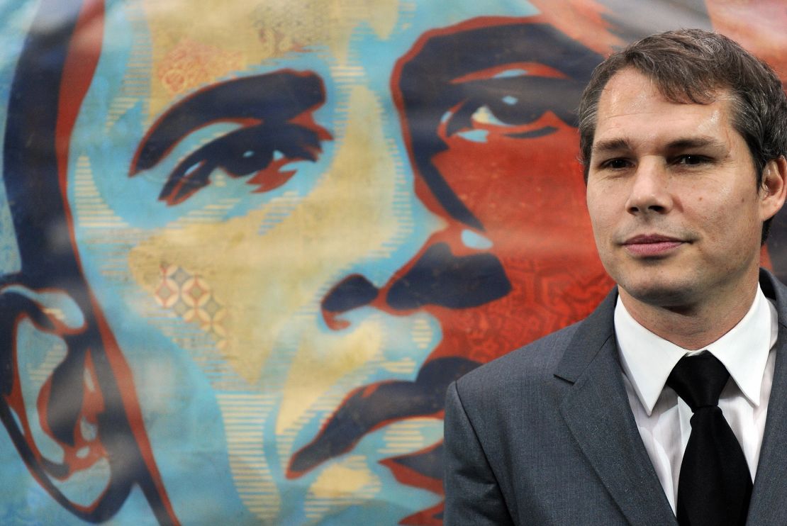 Artist Shepard Fairey unveils his portrait of US President-elect Barack Obama before it was installed at the National Portrait Gallery in Washington on January 17, 2009. 