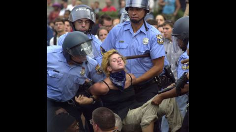 <strong>2000:</strong> Officers carry a protester to a van during the 2000 Republican National Convention in Philadelphia. Demonstrators committed various acts of civil disobedience, bringing traffic in Center City Philadelphia to a crawl.