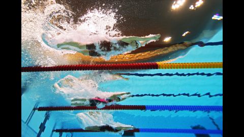 Daniela Schulte of germany, Naomi Ikinaga of Japan and Nadia Baez of Argentina compete in the women's 400m freestyle - S11 Heat 2 on Friday.