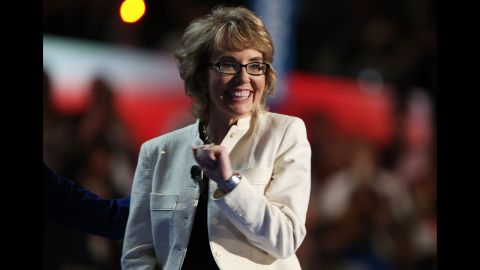 Former U.S. Rep. Gabrielle Giffords stands on stage during the final day of the Democratic National Convention.
