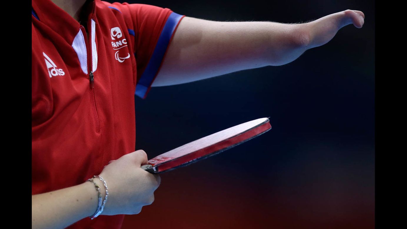 Audrey Le Morvan of France prepares to serve against Poland in the women's team table tennis bronze medal match on Saturday.