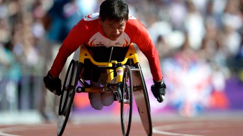 Toshihiro Takada of Japan competes in the men's 200-meter T52 heats on Saturday.