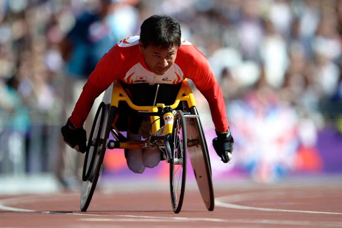 Toshihiro Takada of Japan competes in the men's 200-meter T52 heats on Saturday.