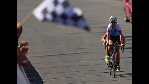 Robbi Weldon and Lynne Bessette of Canada ride in the women's cycling road race on Saturday.