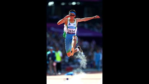 Doniyor Saliev of Uzbekistan competes in the men's triple jump F12 final on Saturday.