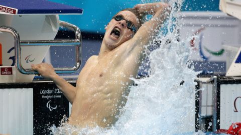 Jack Bridge of Great Britain celebrates after his men's 100-meter breaststroke on Saturday.