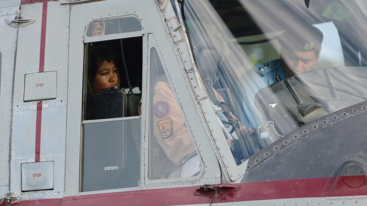 Rimsha Masih, a Christian girl accused of blasphemy sits in helicopter after her release from jail in Rawalpindi.