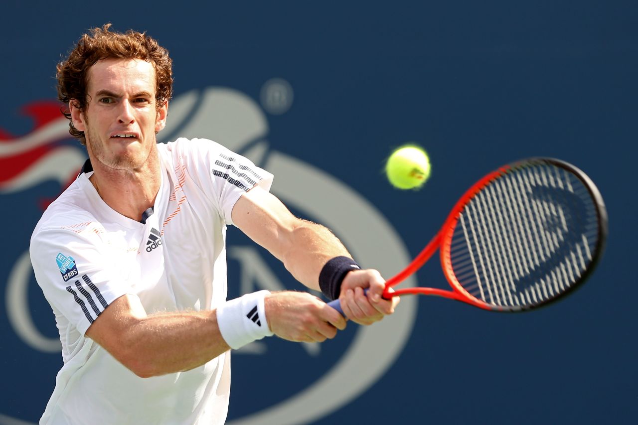 British Andy Murray returns a shot against Czech Tomas Berdych during his men's singles semifinal match in the 2012 U.S. Open on Saturday, September 8.  
