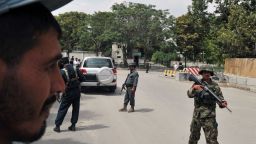 Afghan security forces stand guard at the site of a suicide attack in the city's diplomatic quarters on September 8.
