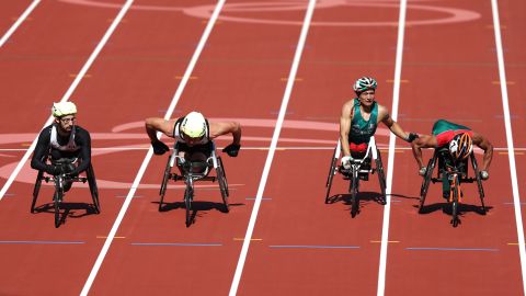 From left to right: Canada's Brent Lakatos passes over to teammate Alexandre Dupont and Mexico's Juan Pablo Cervantes Garcia to Jaime Ramirez Valencia in the men's 4x400-meter relay on Saturday.