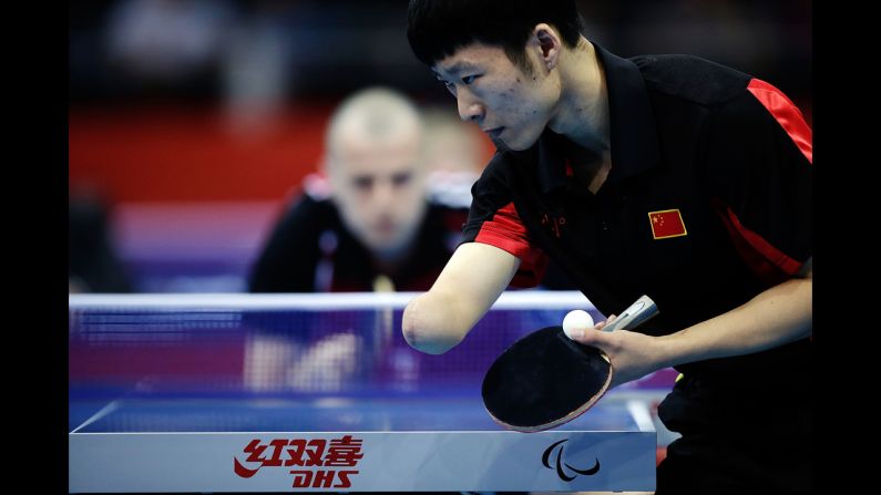China's Yang Ge serves against Poland's Sebastian Powrozniak during the men's team table tennis Class 9-10 final on Saturday.