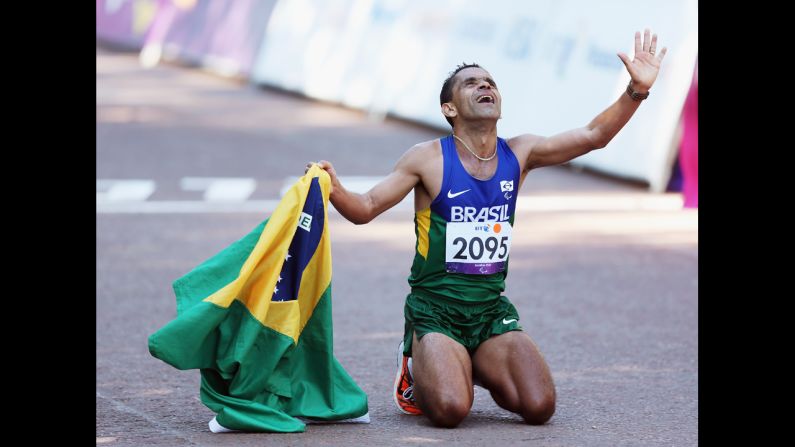 Tito Sena of Brazil celebrates winning the men's T46 marathon on Sunday, September 9, the final day of the London 2012 Paralympics.