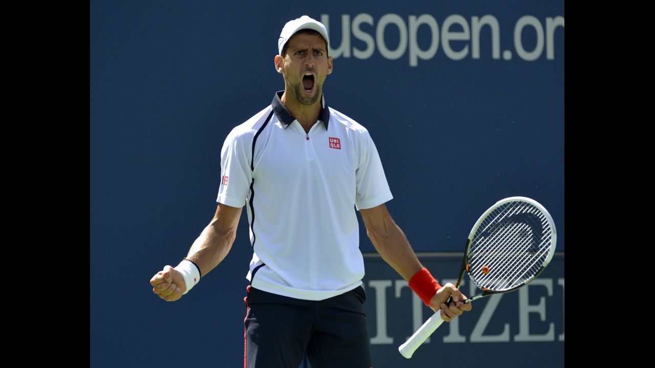 Djokovic reacts to winning a point against Ferrer during the match Sunday.