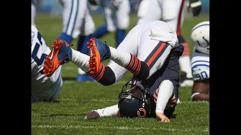 No. 6 Jay Cutler of the Bears ends up on his back after being hit while passing against the Colts in Chicago on Sunday.