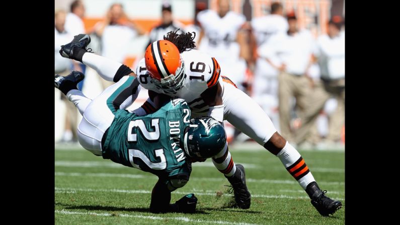 Cornerback No. 22 Brandon Boykin of the Eagles is hit by wide receiver No.16 Joshua Cribbs of the Browns on Sunday in Cleveland.