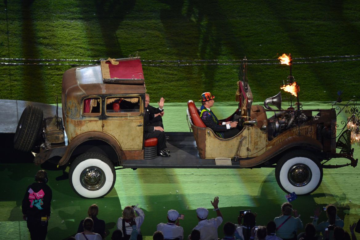 Britain's Prince Edward, Earl of Wessex, waves as he is driven into the arena.