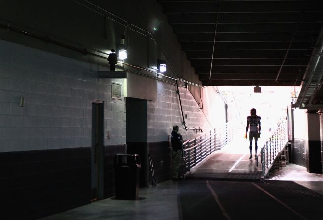 No. 25 cornerback Richard Sherman of the Seahawks walks out onto the field before the season opener against the Cardinals in Glendale, Arizona, on Sunday.