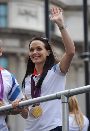 Cyclist Victoria Pendleton waves to the fans after winning both a gold and a silver medal at the Olympics.