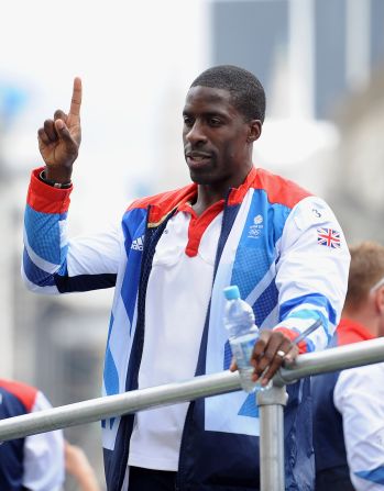 Track sprinter Dwain Chambers salutes the crowd. Chambers almost missed out on participating in the Olympics after failing a drugs test in 2003. His life ban was overturned in April, 2012.