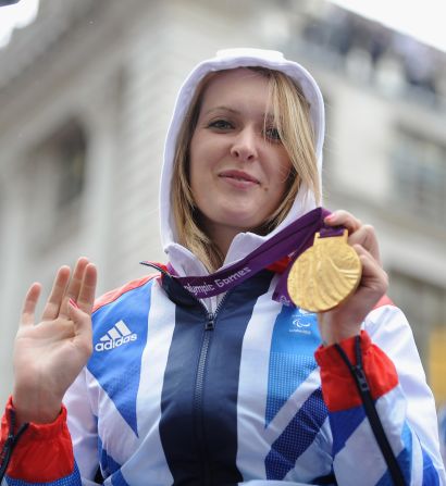 Olympic gold medal winning archer Danielle Brown waves to the crowd.