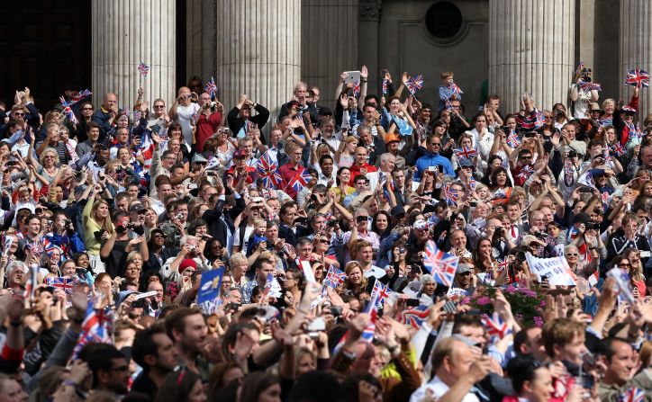 The crowd cheers during the London 2012 Victory Parade for Team GB and Paralympic GB athletes on September 10, 2012 in London, England.