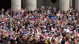The crowd cheers during the London 2012 Victory Parade for Team GB and Paralympic GB athletes on September 10, 2012 in London, England.