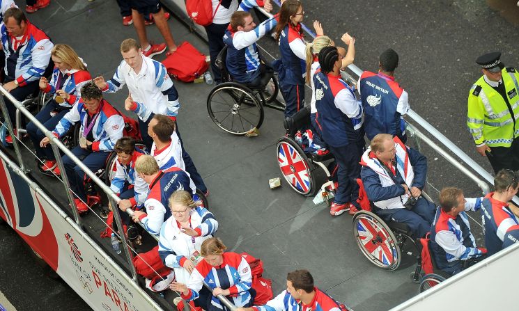 Members of Paralympic GB atop one of the floats.