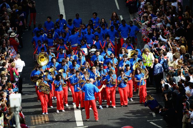 A marching band forms part of the Victory Parade.