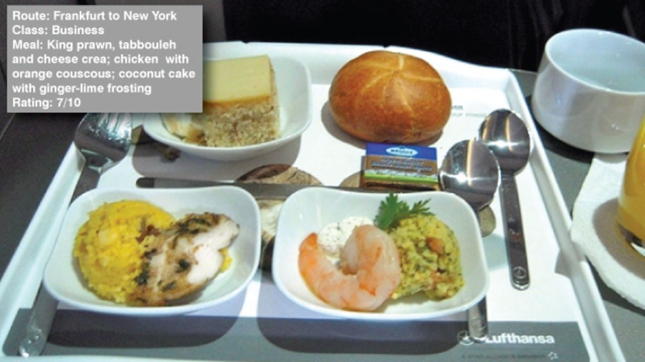 George Stoner reviewed his in-flight food between Frankfurt and New York on AirlineMeals.com saying: "Again service was a bit off -- note the lack of table cloth... The food itself was fine, especially the orange couscous."
