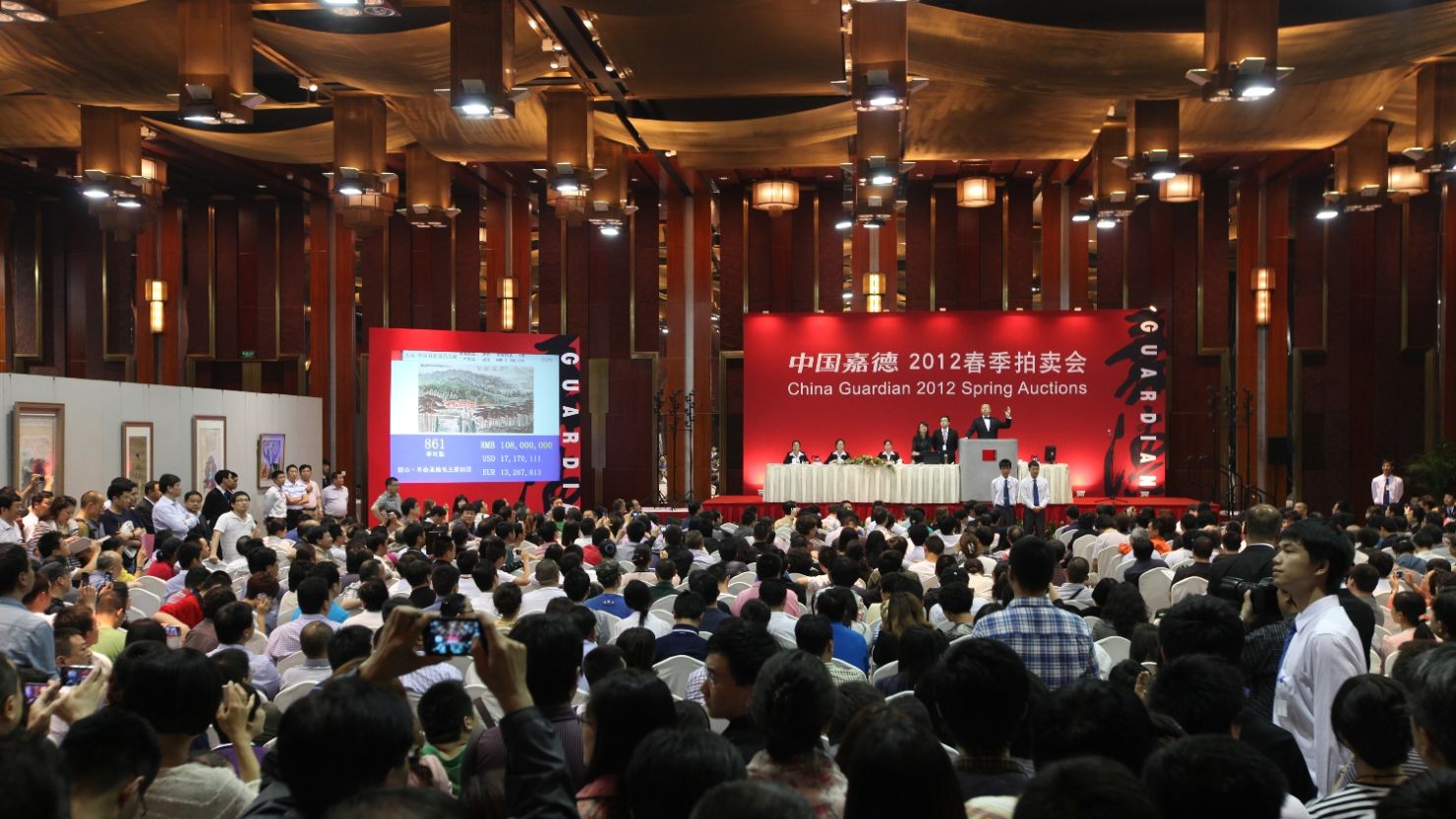 Packed salerooms like this have helped China Guardian become the world's fourth largest auction house