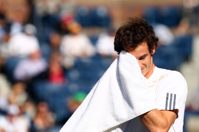 Andy Murray of Great Britain wipes his face with a towel during his men's singles final match against Novak Djokovic of Serbia on Monday.