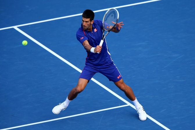 Novak Djokovic of Serbia returns a shot at the 2012 U.S. Open on Monday.