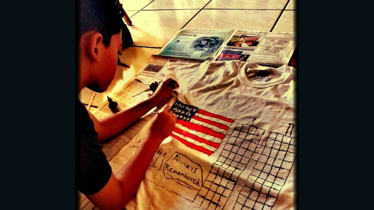 5th grader Jonathan Cofresi creates a shirt to wear to school on Tuesday.