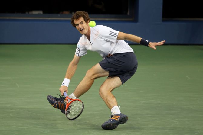 Andy Murray returns a shot against Novak Djokovic on Monday.