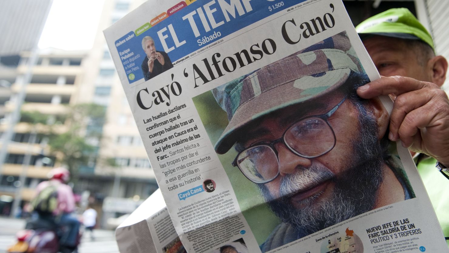 A man at a newsstand n Medellin, Colombia, reads about the death of the leader of FARC last year.