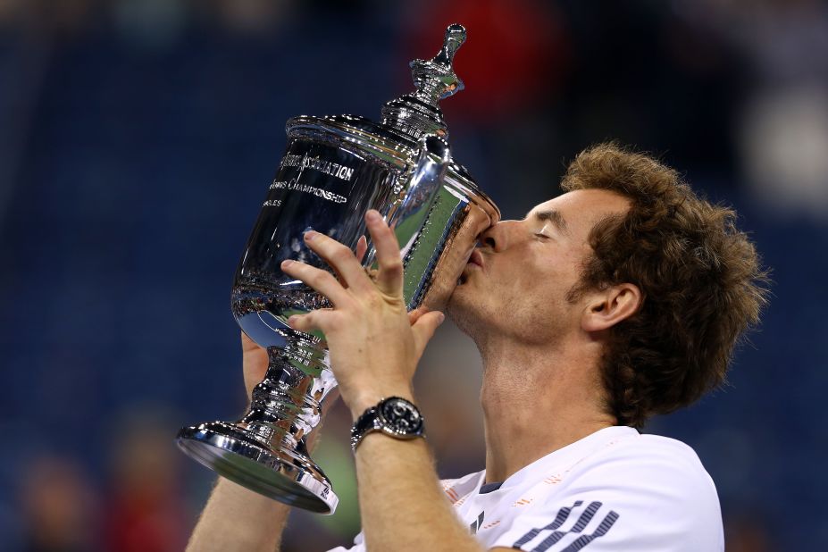 Andy Murray gets his hands on a grand slam trophy at last as he beats Novak Djokovic of Serbia to win the 2012 U.S. Open at Flushing Meadows.