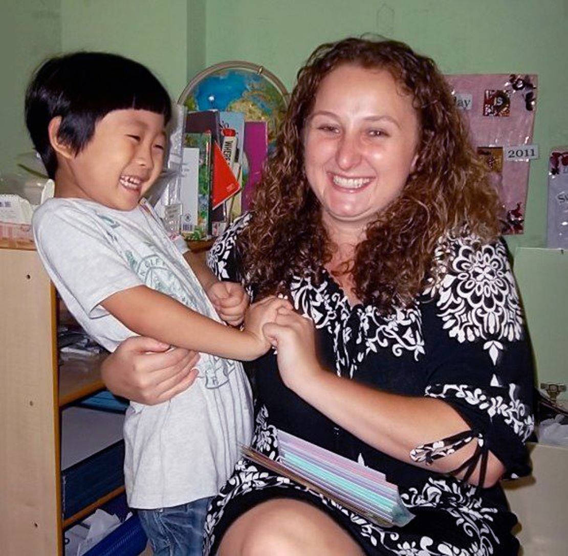 Kari Bowerman shares a laugh with one of her students in Seoul, South Korea. 