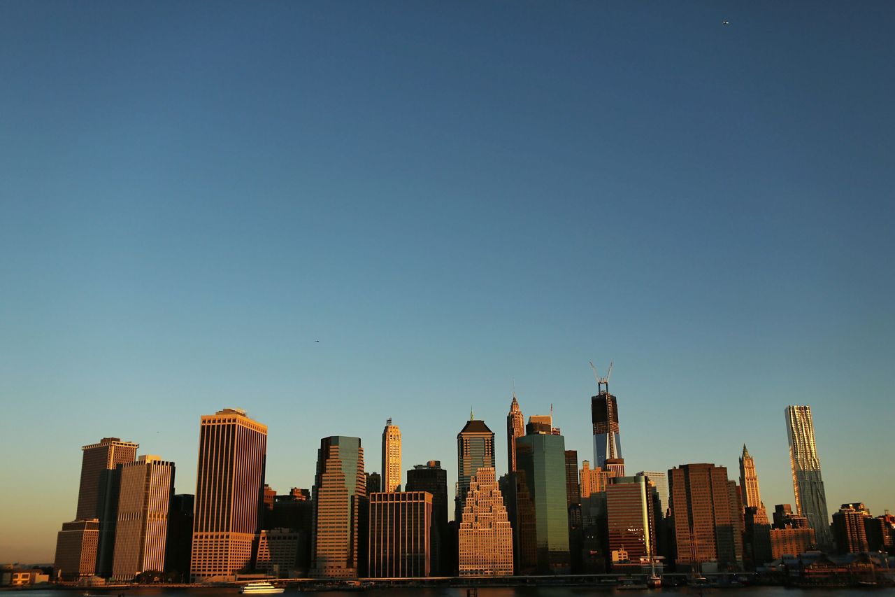 The skyline of Lower Manhattan now contains One World Trade Center, which is scheduled to be completed in 2013.