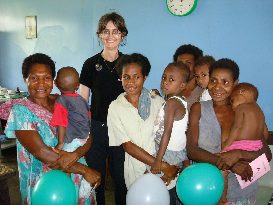 Dr. Deborah Mills works abroad in a vaccination clinic. 