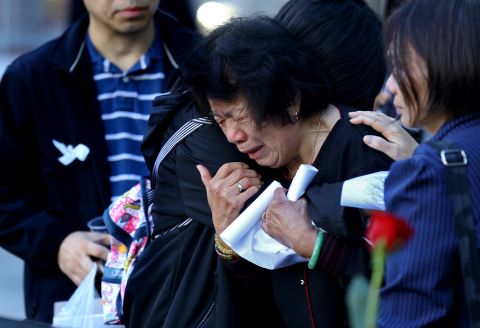 A woman cries during the rememberance ceremonies at the World Trade Center site in New York on Tuesday.