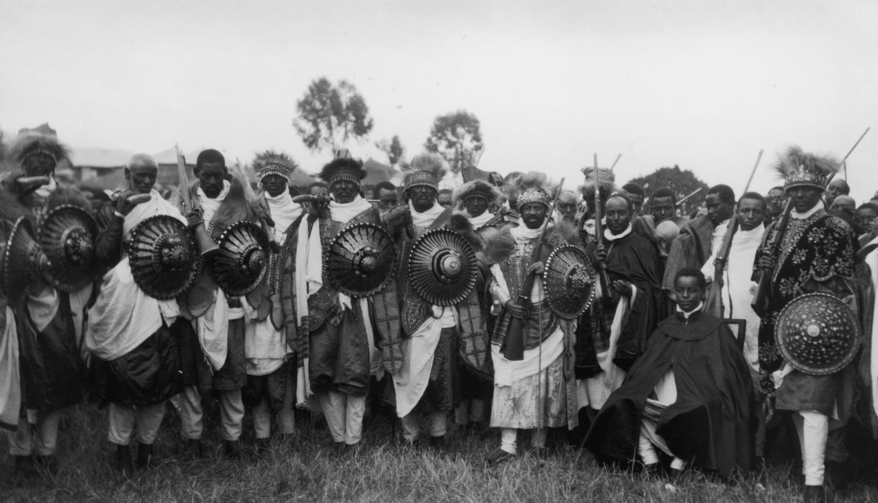 A group of soldiers from the army of Abyssinia (modern Ethiopia) is pictured with reinforced shields and rifles during the war with Mussolini-led Italy. Italy would take Addis Ababa and annex Abyssinia on May 9, 1936, after its emperor, Haile Selassie, flees.