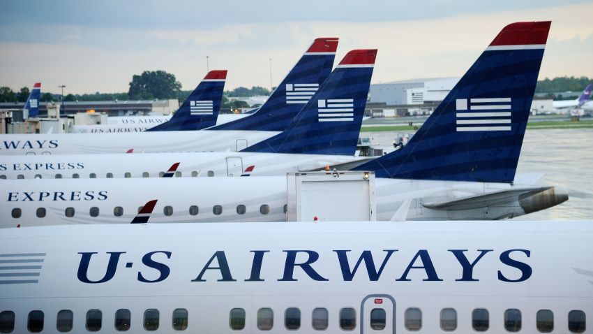 CHARLOTTE, NC - SEPTEMBER 01: U.S. Airways planes sit on the tarmac at Charlotte/Douglas International Airport on September 1, 2012 in Charlotte, North Carolina. American Airlines and U.S. Airways have announced that they have begun merger talks. (Photo by Kevork Djansezian/Getty Images) 