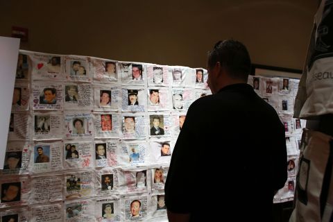 Pictures of loved ones killed in the attacks are displayed at a preview of the National September 11 Memorial Museum's memorial exhibition on Monday in New York.