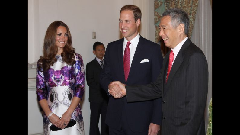 The Duke and Duchess of Cambridge meet Prime Minister Lee Hsien Loong at the Istana for a state dinner on the first day of their Diamond Jubilee tour in Singapore. <a href="index.php?page=&url=http%3A%2F%2Fwww.cnn.com%2FSPECIALS%2Fworld%2Fphotography%2Findex.html">See more of CNN's best photography</a>.