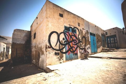 eL Seed's "Writing History," painted this year in the Tunisian town of Kairouan