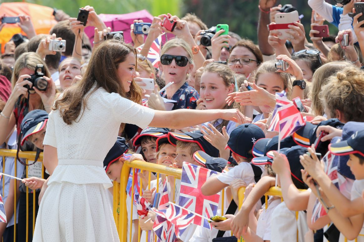 Catherine, Britain's Duchess of Cambridge, meets children at Gardens by the Bay on day two of her Asia visit with husband, Prince William, Wednesday in Singapore. 