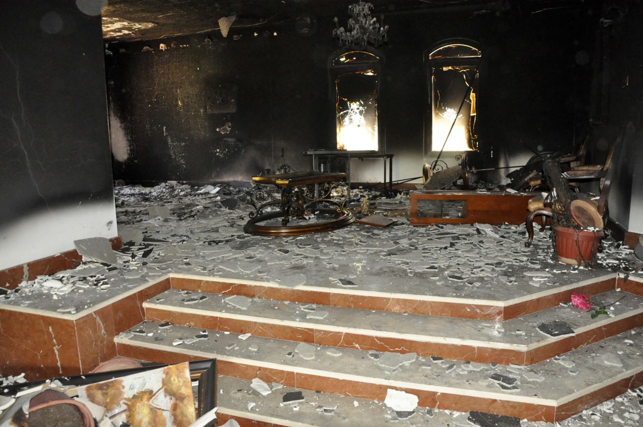 Smoke and fire damage is evident inside a building on September 12.
