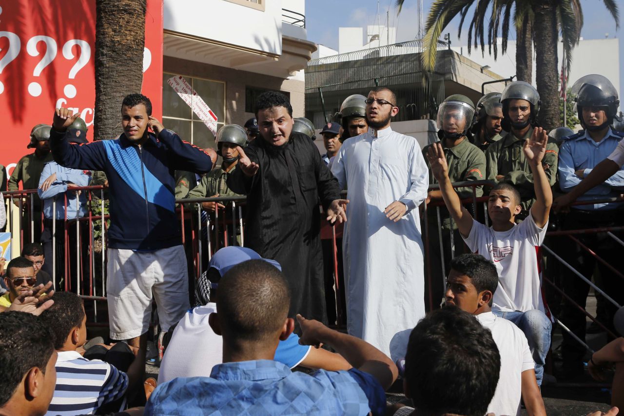 Police confront protesters praying in front of the U.S. Embassy in Casablanca, Morocco, during a rally against the anti-Islam film on Wednesday.